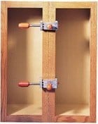 Clamped cabinet