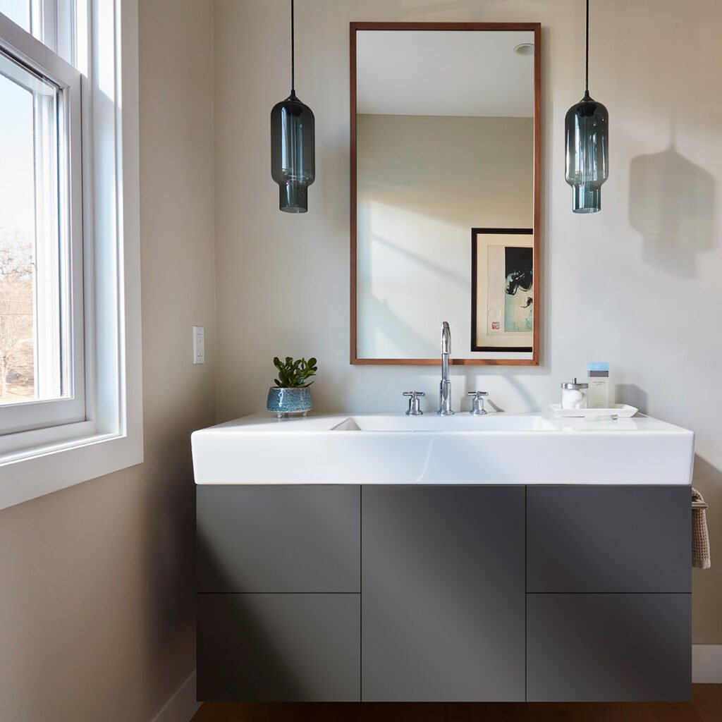 Frameless vanity cabinets in bathroom