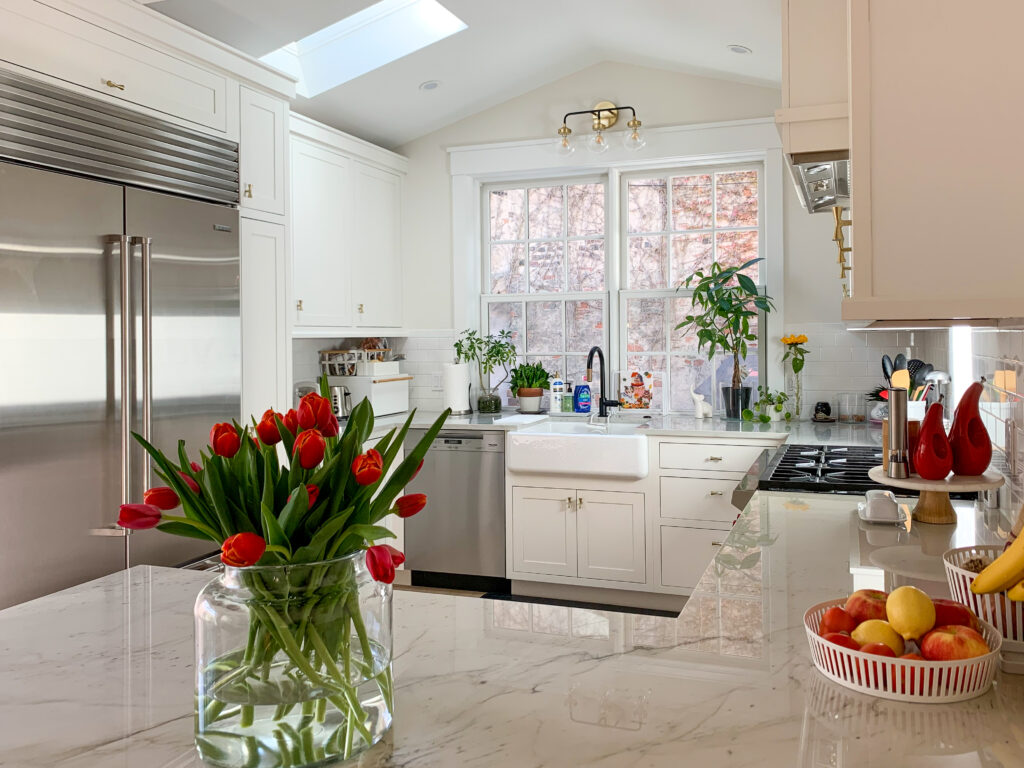 beautiful tulips on gorgeous granite countertop in kitchen