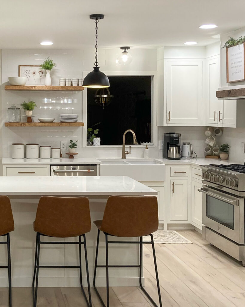 pretty white kitchen with inset white cabinets