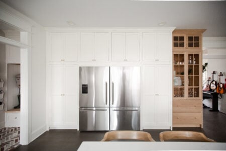 Flush Inset, TW-10 door with regular framing bead, Slab drawer fronts, Frosty White. Island & Tall Cabinet: Rift Cut White Oak (finished by customer)