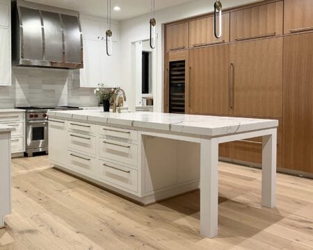 Painted: Flush inset, MDF slab doors, Arctic White. Wood: Full Overlay, Savoy doors, Rift Cut White Oak, Natural/clearcoat finish