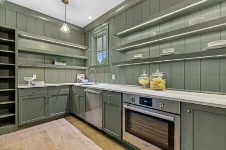 Full overlay, Fern Colourtone, TW-1038 doors, slab drawerfronts, trim sourced by customer