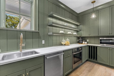 Full overlay, Fern Colourtone, TW-1038 doors, slab drawerfronts, trim sourced by customer