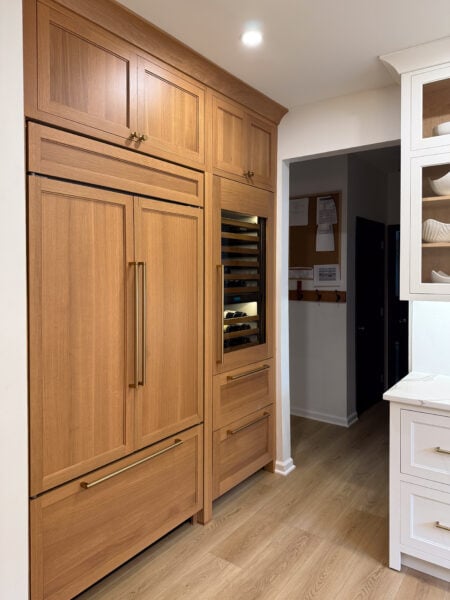 Flush Inset, White Oak, Nutmeg wiping stain, Crawford doors & drawerfronts (top slab), Large Cove 2618, Inset Shaker Light Rail 2671